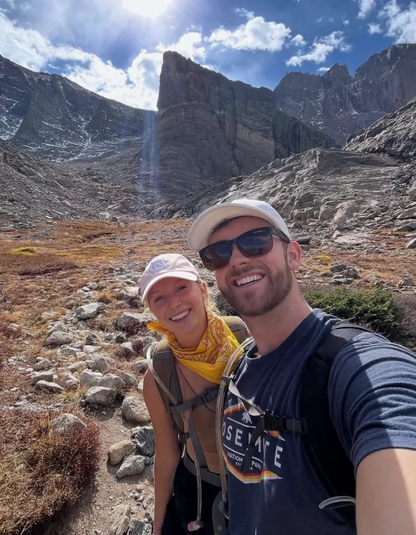 Michael and Amy hiking in the mountains